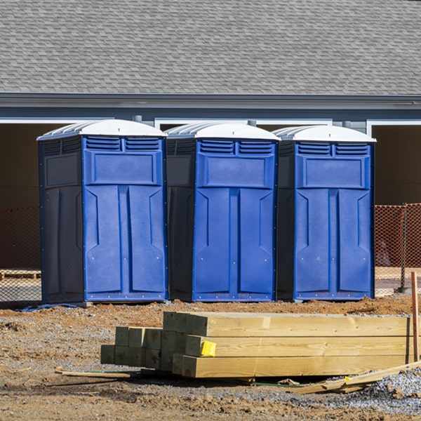 what is the cost difference between standard and deluxe portable restroom rentals in Bainbridge Island WA